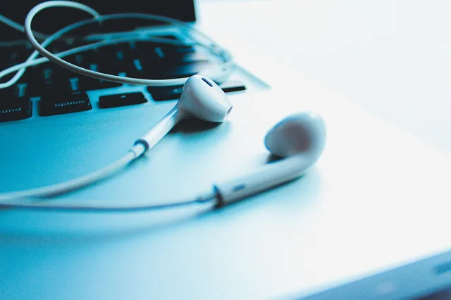 music, headphones, headset, listening, earphone, sound, earbuds, desk, laptop, computer, macbook, keyboard, macbook pro, tech, technology, apple, electronics, minimal, digital, computer hardware, computer keyboard, minimal tech, blue computer, blue music, blue laptop, blue apple, blue tech, blue desk, blue keyboard, blue headphones, headphones, headphones, headphones, listening, earphone, earbuds, earbuds, earbuds, earbuds, earbuds, computer, blue tech, blue headphones. How to grow a loyal podcast audience: where to start